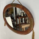 Small oval Art Deco mirror in brown and gold 33x54.