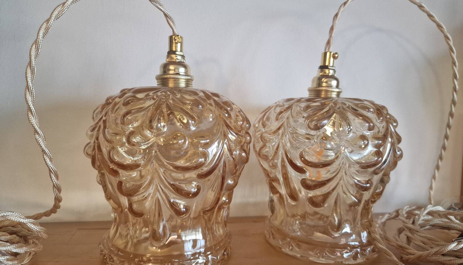 Duo of amber molded glass portable lamps