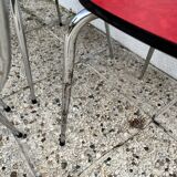 Chairs in formica red foot compass