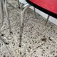 Chairs in formica red foot compass