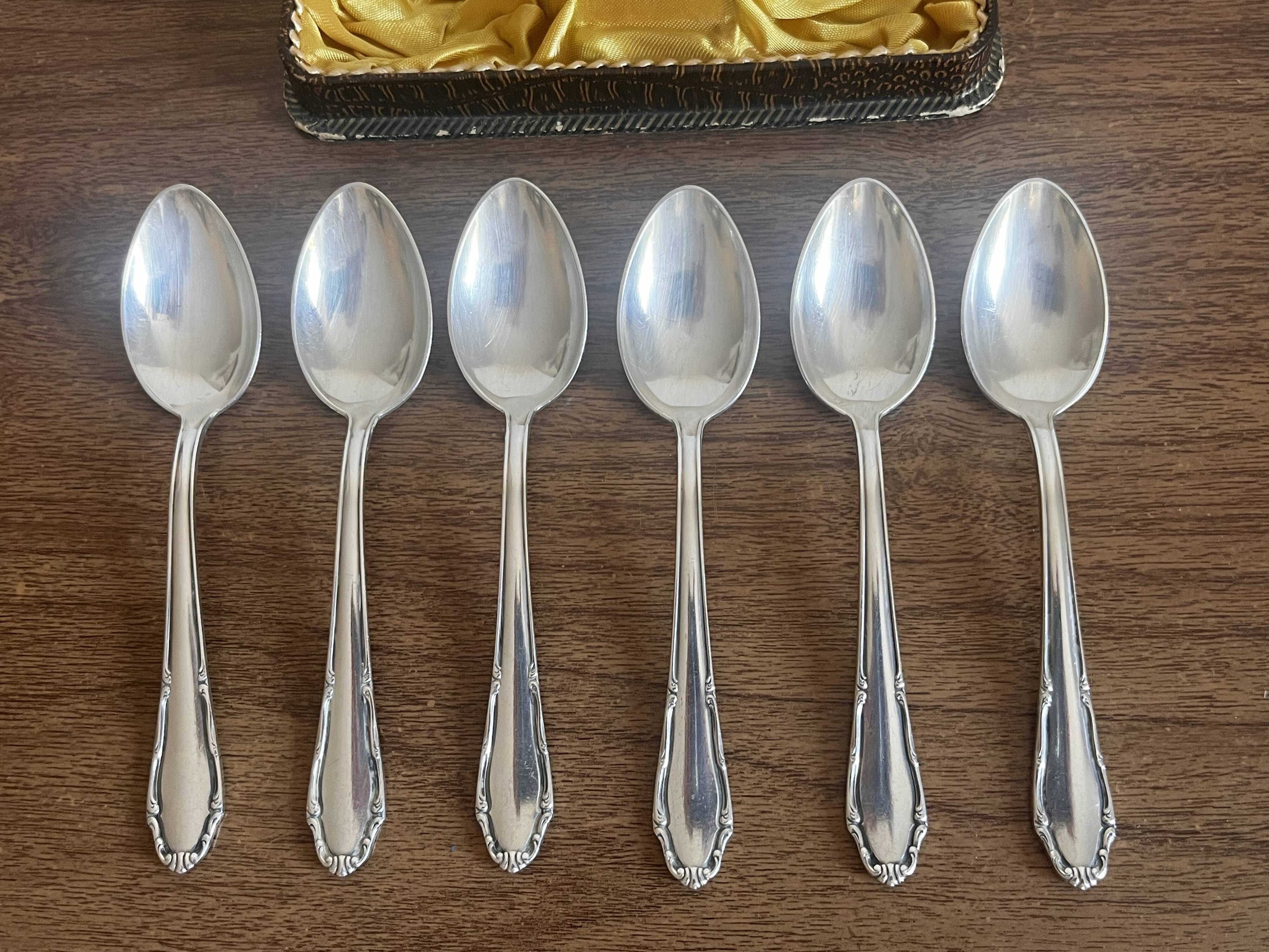 Small silver-plated metal spoons