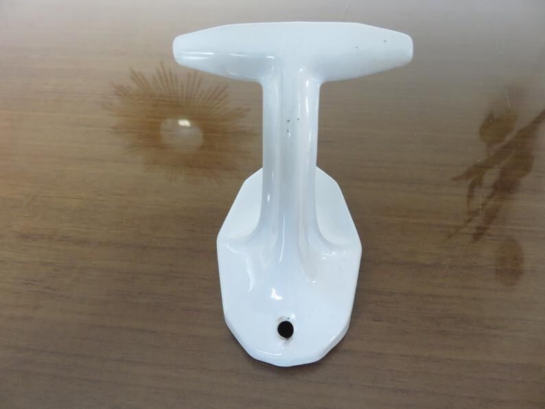 Pair of white cast iron patères art deco 30 40