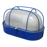 Blue industrial wall or ceiling light.