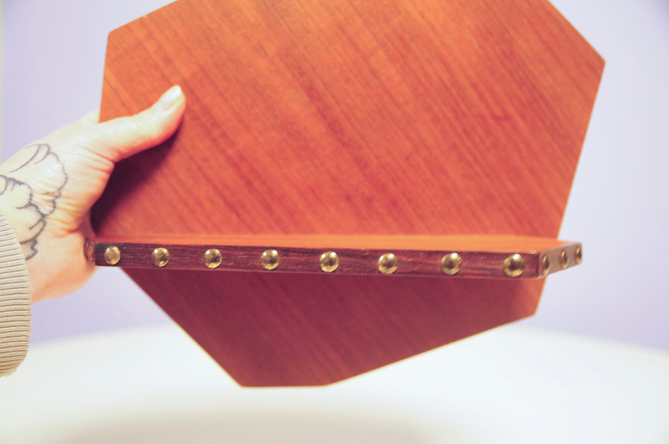 Asymmetrical wall shelf studs