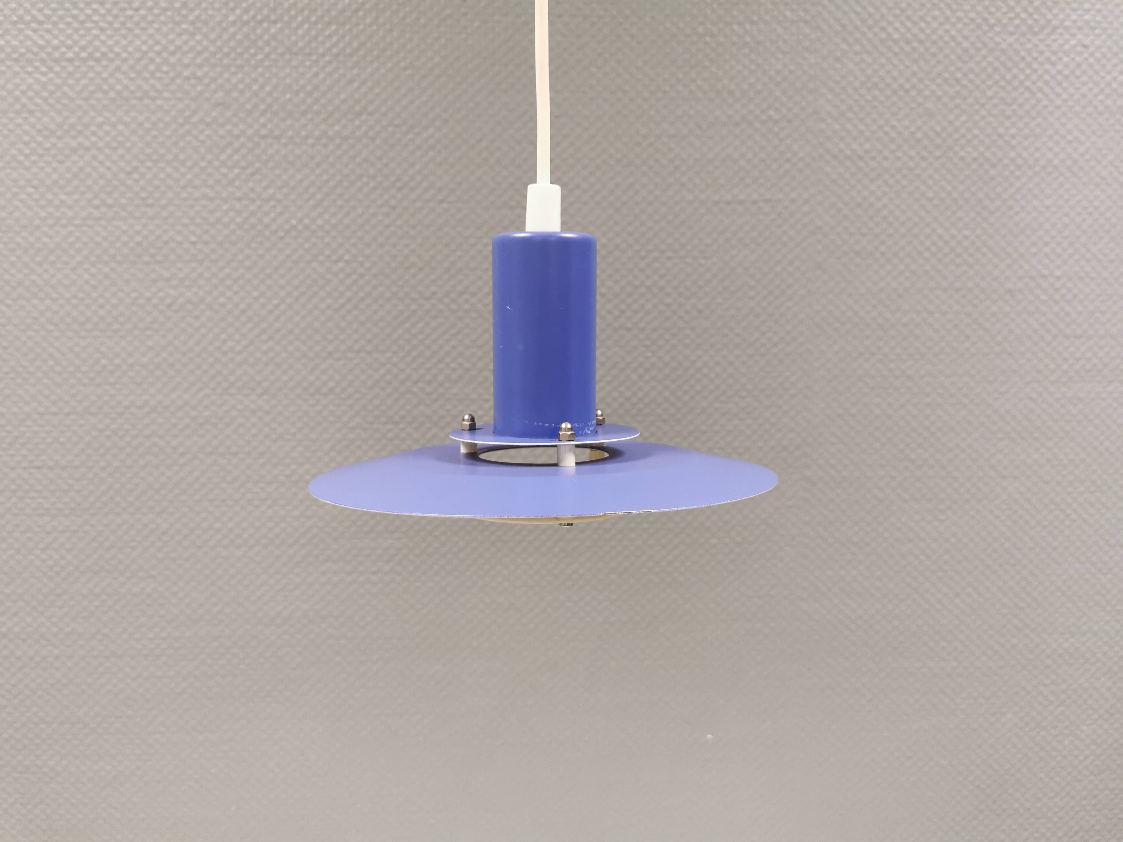 A blue minimalist hanging lamp from Lyfa Denmark 1980s.