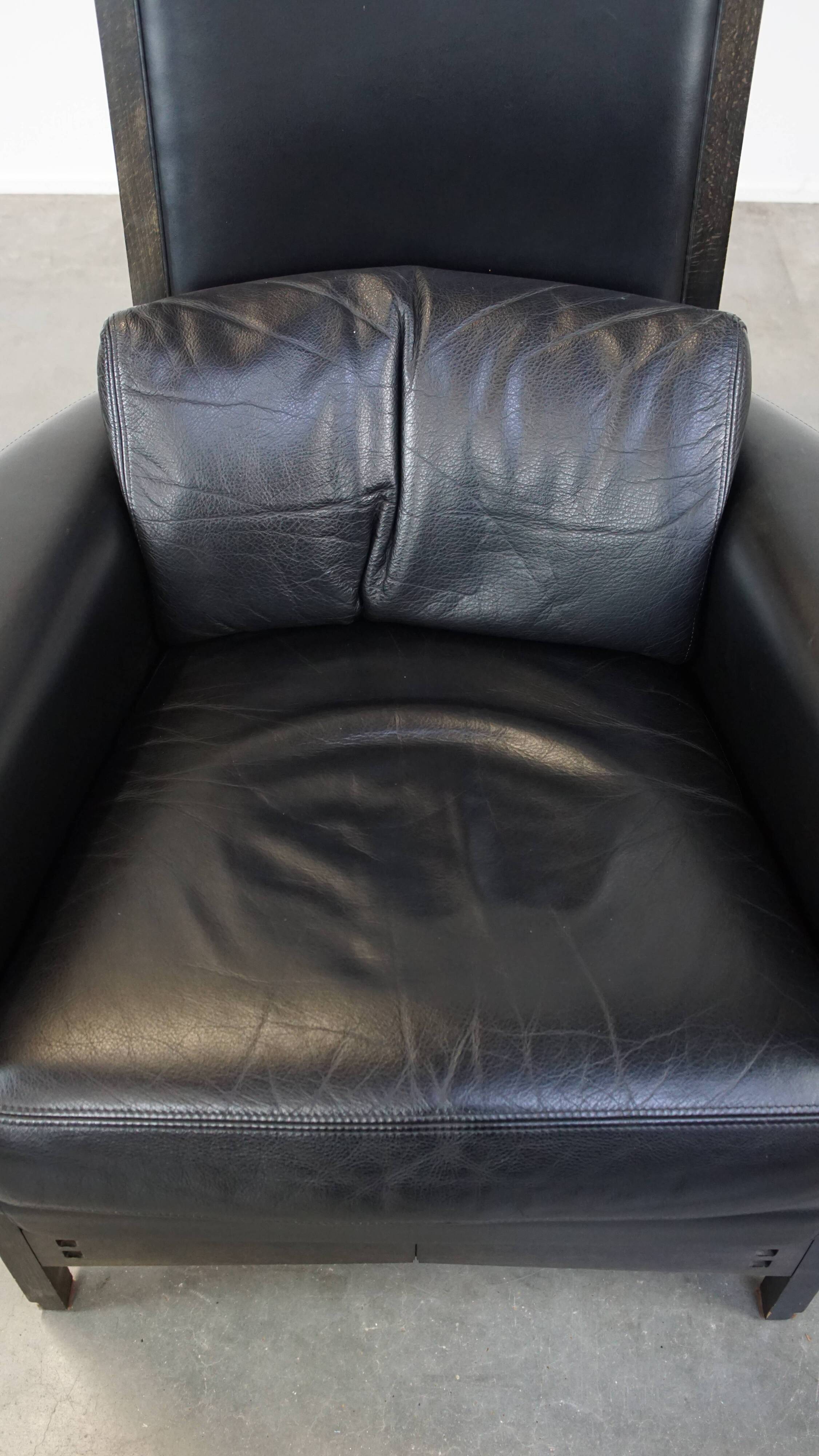 Fauteuil design en cuir noir de Giorgetti
