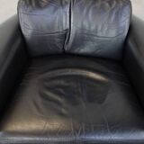 Fauteuil design en cuir noir de Giorgetti