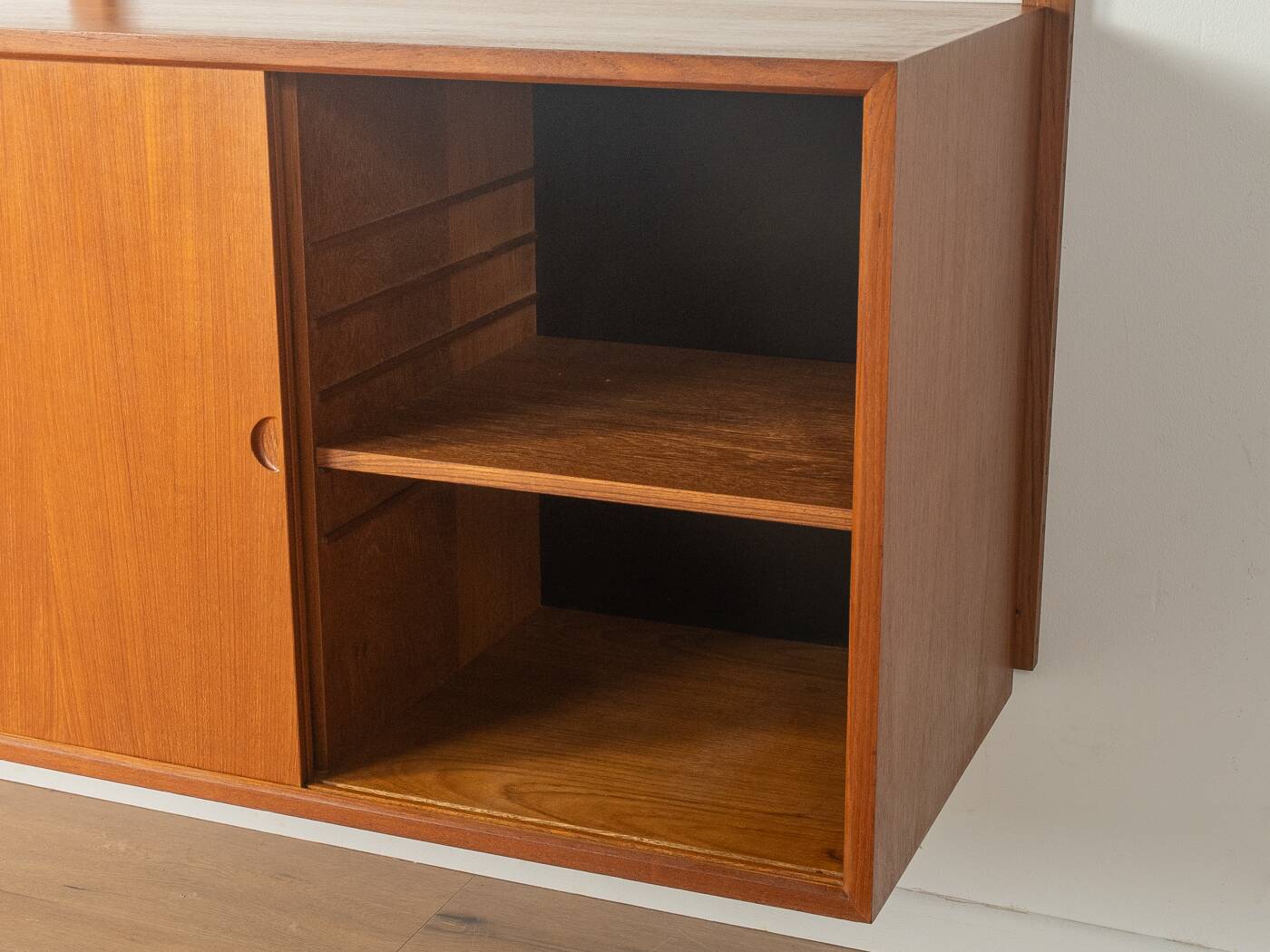 Classic shelving system from the 1950s in teak veneer by Poul Cadovius for Cado
