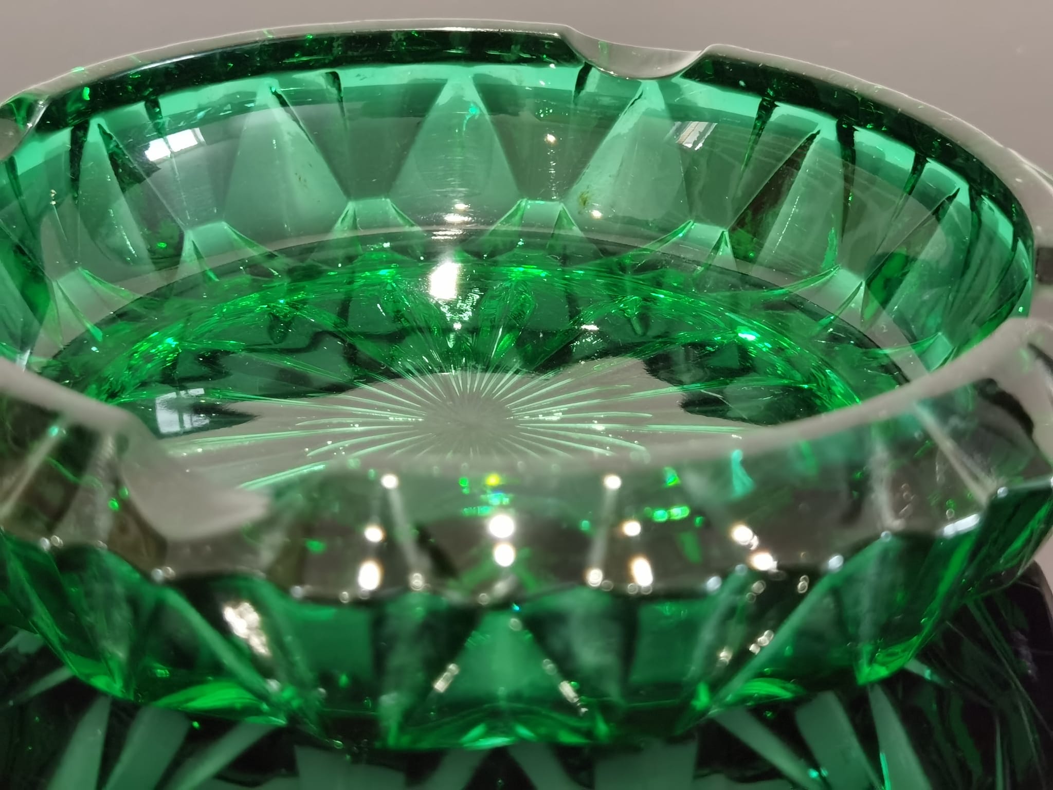 Ashtray in transparent cut glass green color made in france