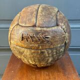Mid-20th century leather soccer ball with visible stitching and beautiful patina