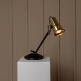 Vintage metal table lamp in Hollywood Regency style, black base with brass shade by Gigidi Iluminazione, 80s