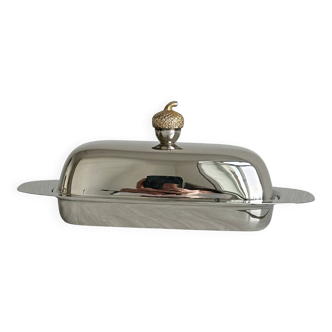 stainless steel butter dish with a golden knob