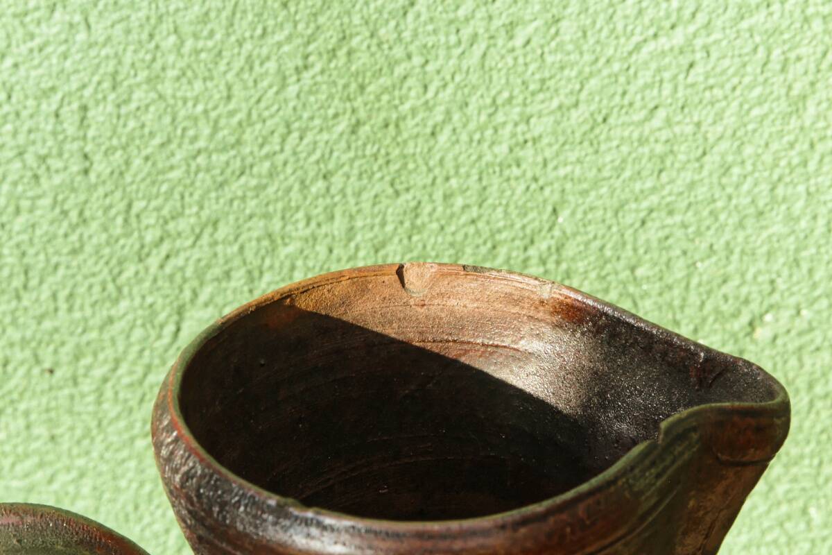 Large stoneware jug with a family name pattern, 1912