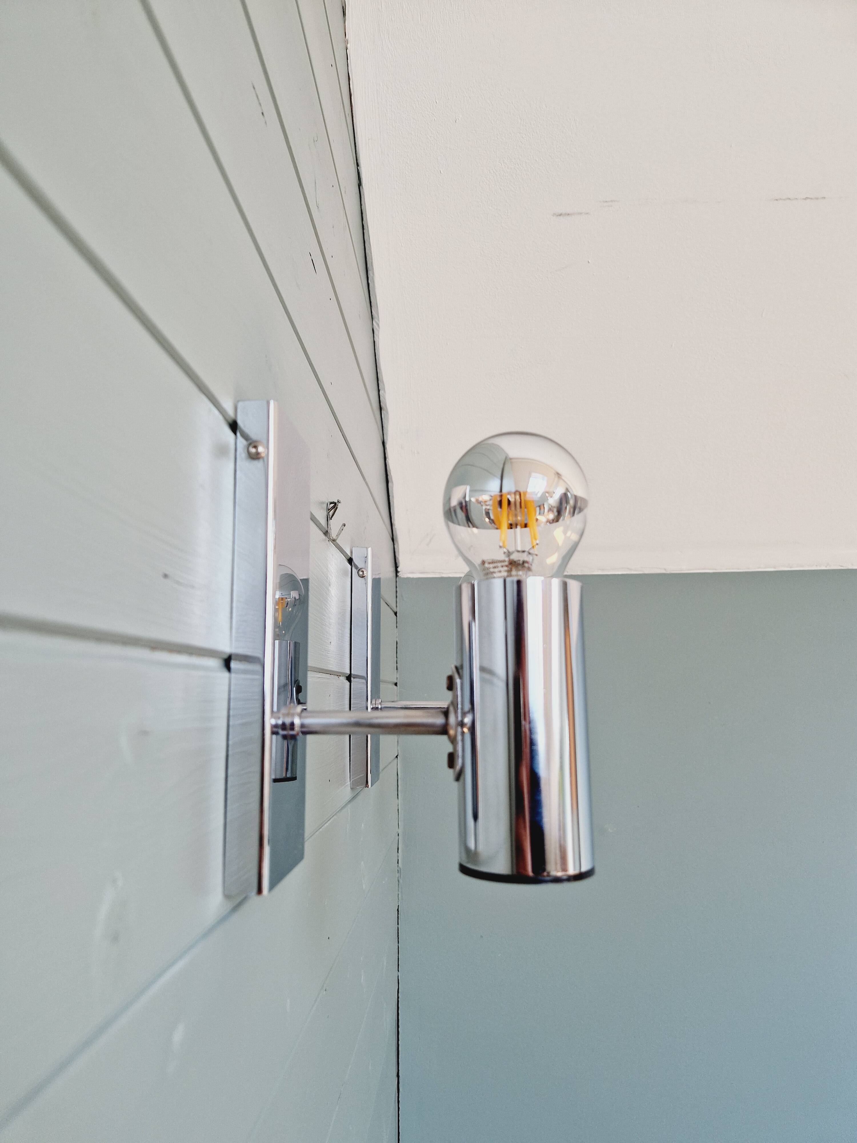 Pair of tubular chrome-plated metal wall sconces, 1970s