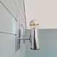 Pair of tubular chrome-plated metal wall sconces, 1970s