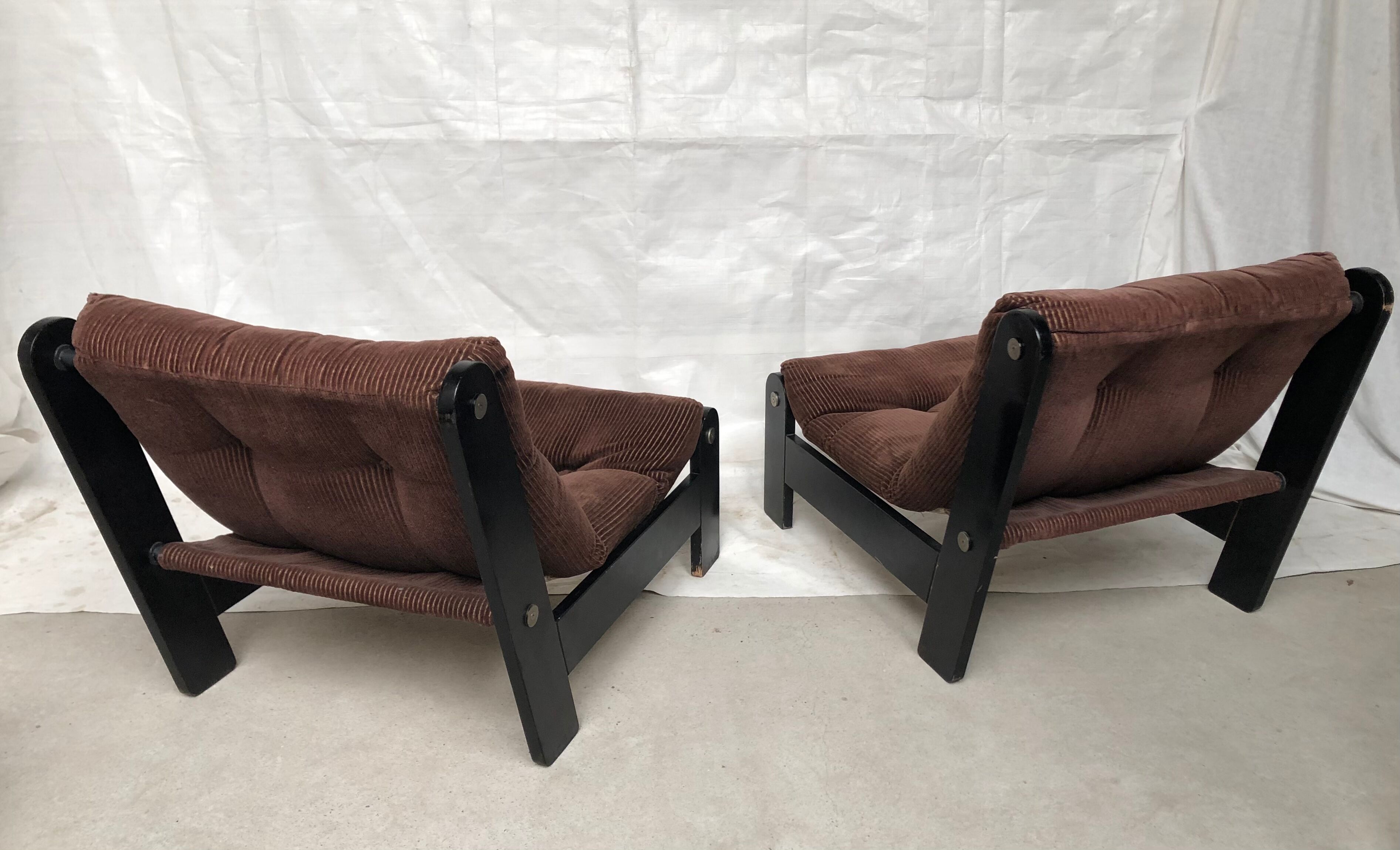 Modernist armchairs wood heaters and brown velvet vintage 70s