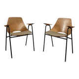 Pair of “Tonneau” armchairs by Pierre Guariche