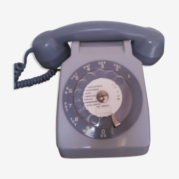 Téléphone gris vintage à cadran