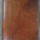 Leather ottoman in classic English style finished with decorative nails