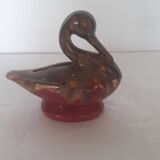 Old piggy bank to break in the shape of a swan