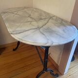 Marble table with cast iron legs in the Café de Paris style