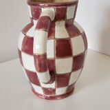 Old ceramic pitcher pattern checkerboard tiles
