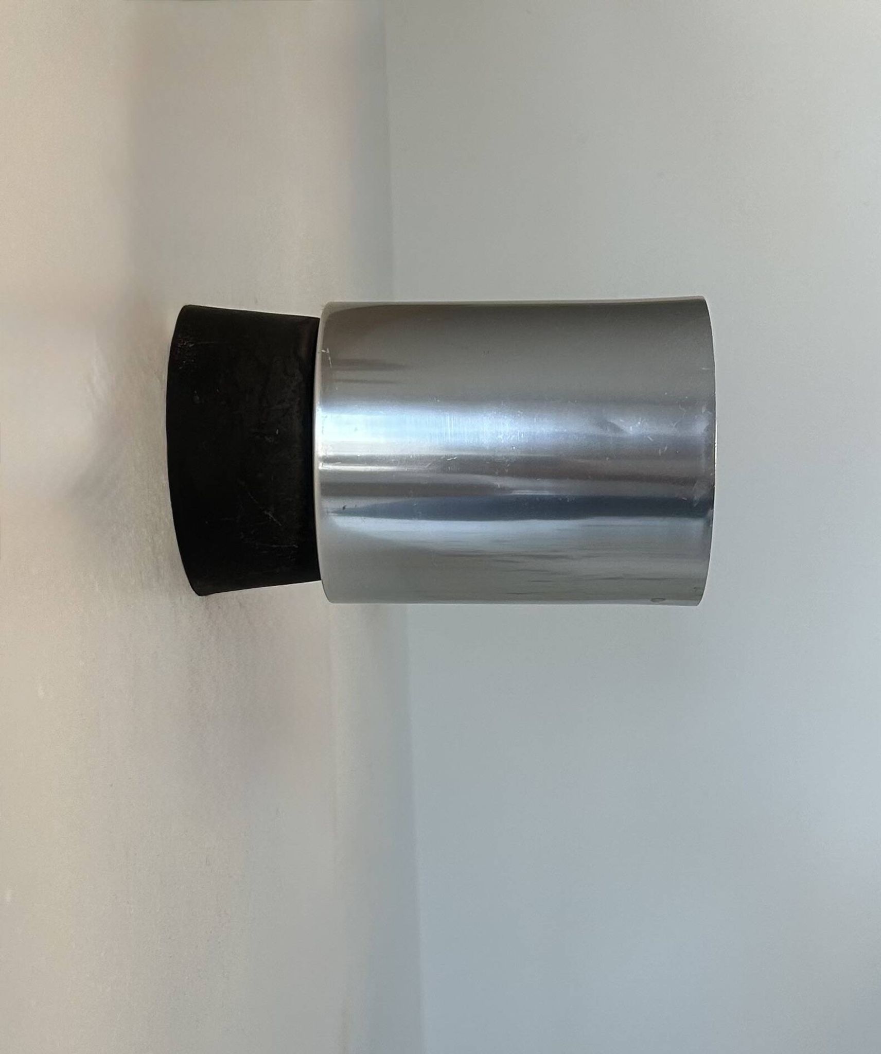 Pair of vintage wall lights, chrome-plated metal and Bakelite, France 1960.