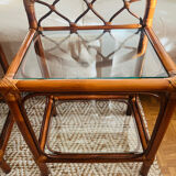 Two rattan and glass bedside tables
