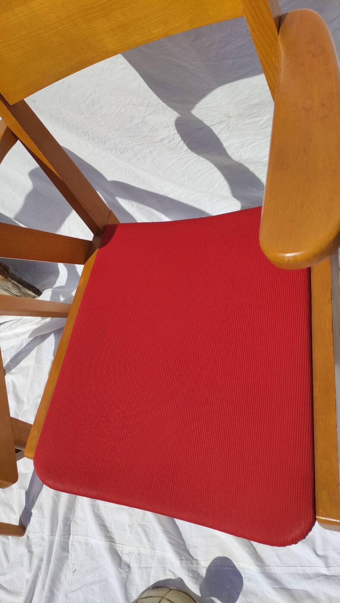 Pair of wooden armchairs and skaï foot compass of the 50s