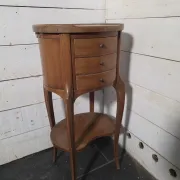 Oval bedside table in Louis XV style made of mahogany.