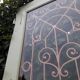 Entrance door 264x99cm old walnut oak wrought iron grille glass panel