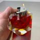 Briquet facetté Sommerso par Flavio Poli, en verre de Murano rouge et jaune, Italie, années 1970.