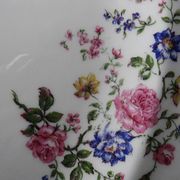 Service plate Bernardaud Limoges porcelain with floral decoration from the 1920s to 1950s.