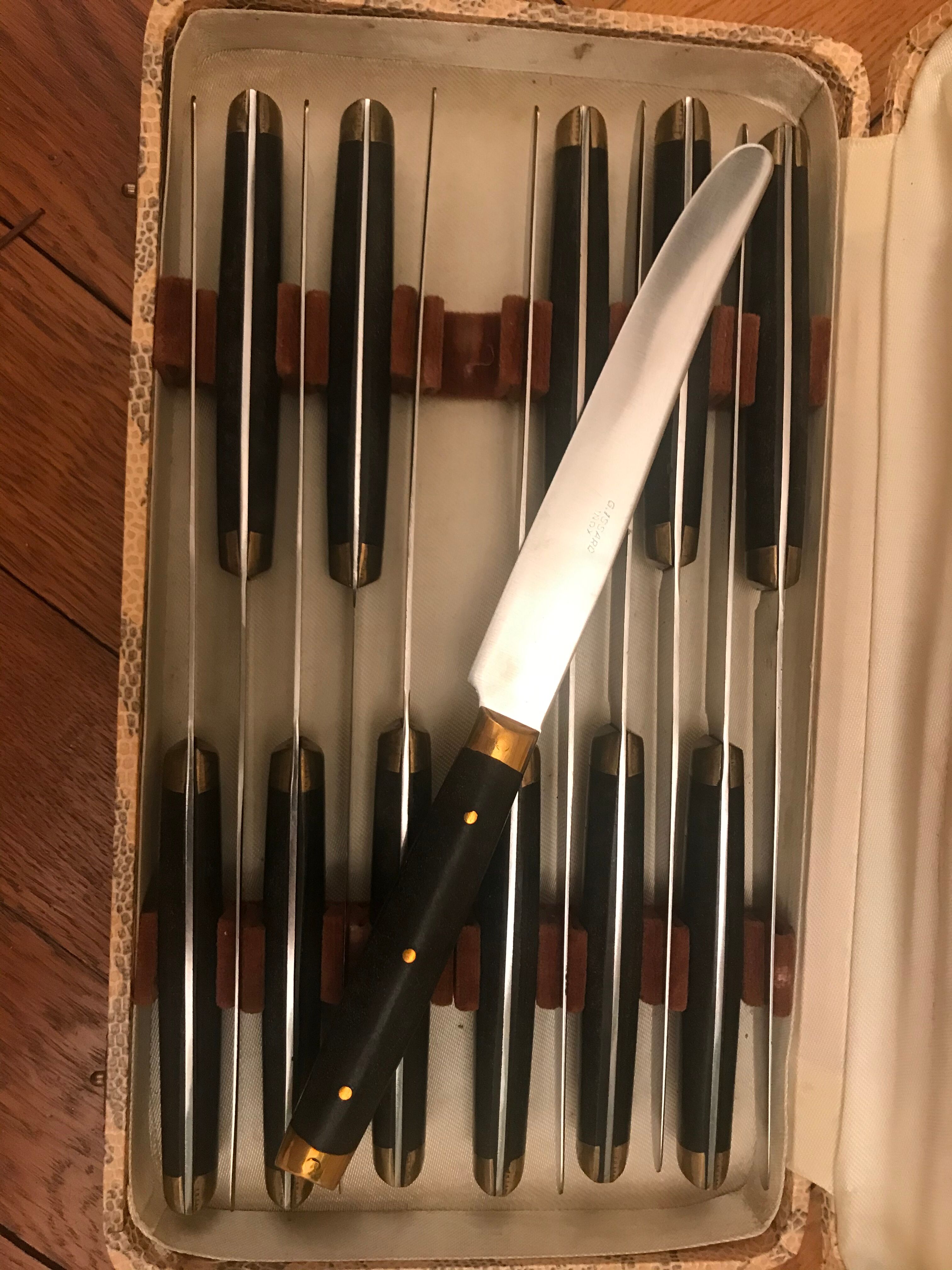 Twelve Ebony Bakelite Knives