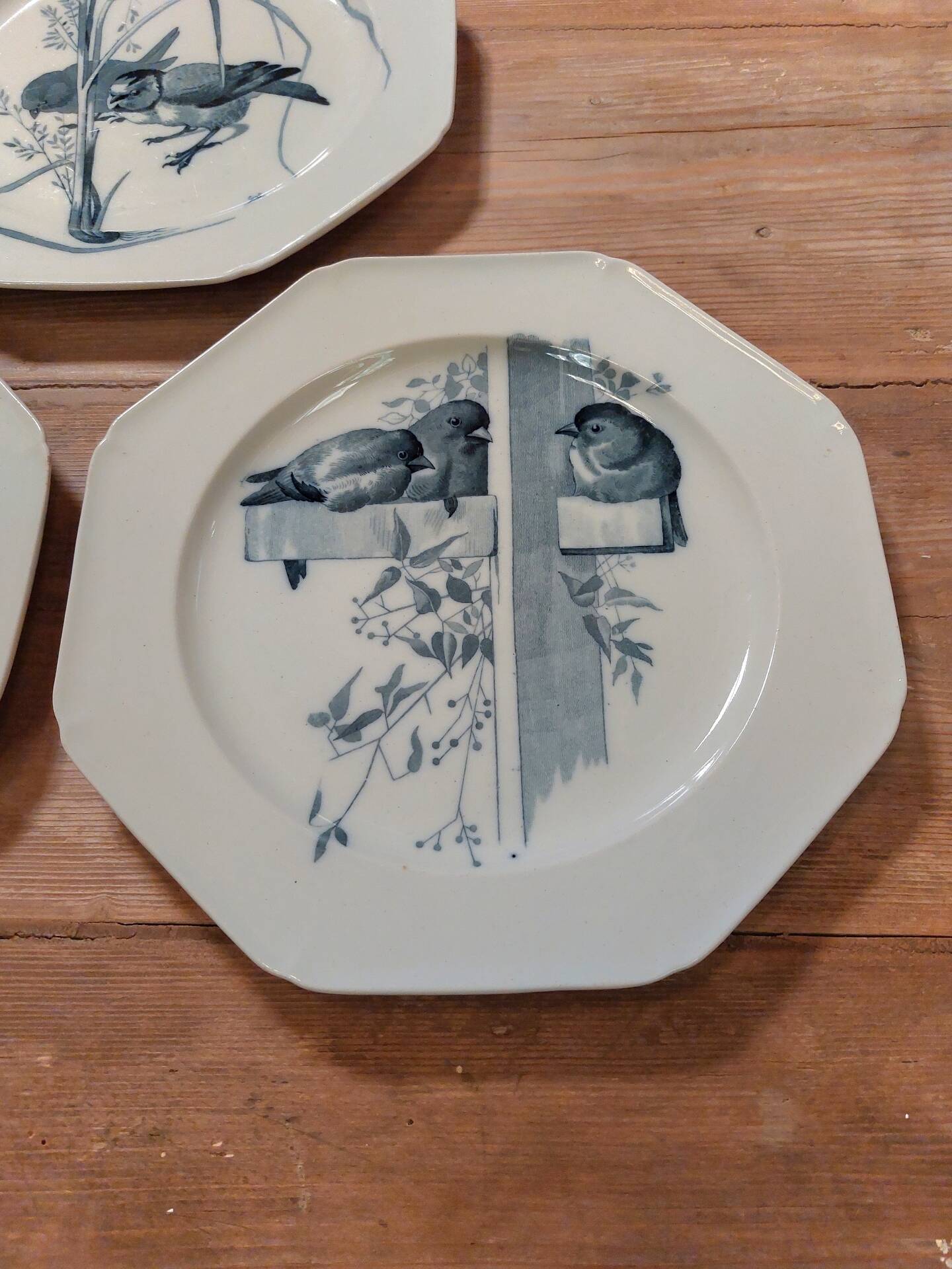 Set of three blue ironstone flat plates.