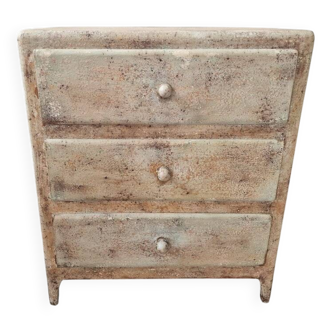 Small chest of drawers with pigments