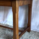 Table style farmhouse table in solid wood.