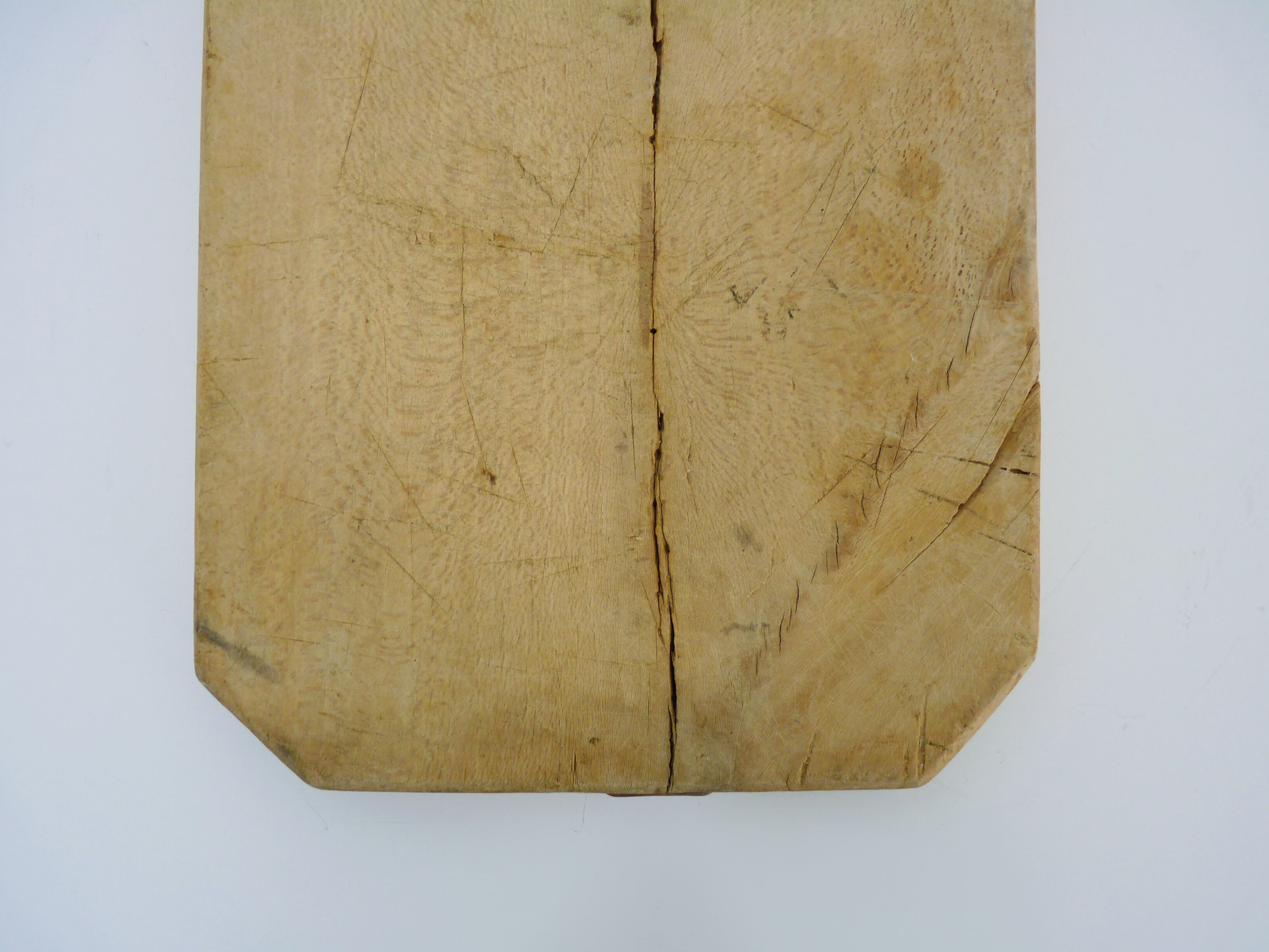 Small and old wooden cutting board. Year 50