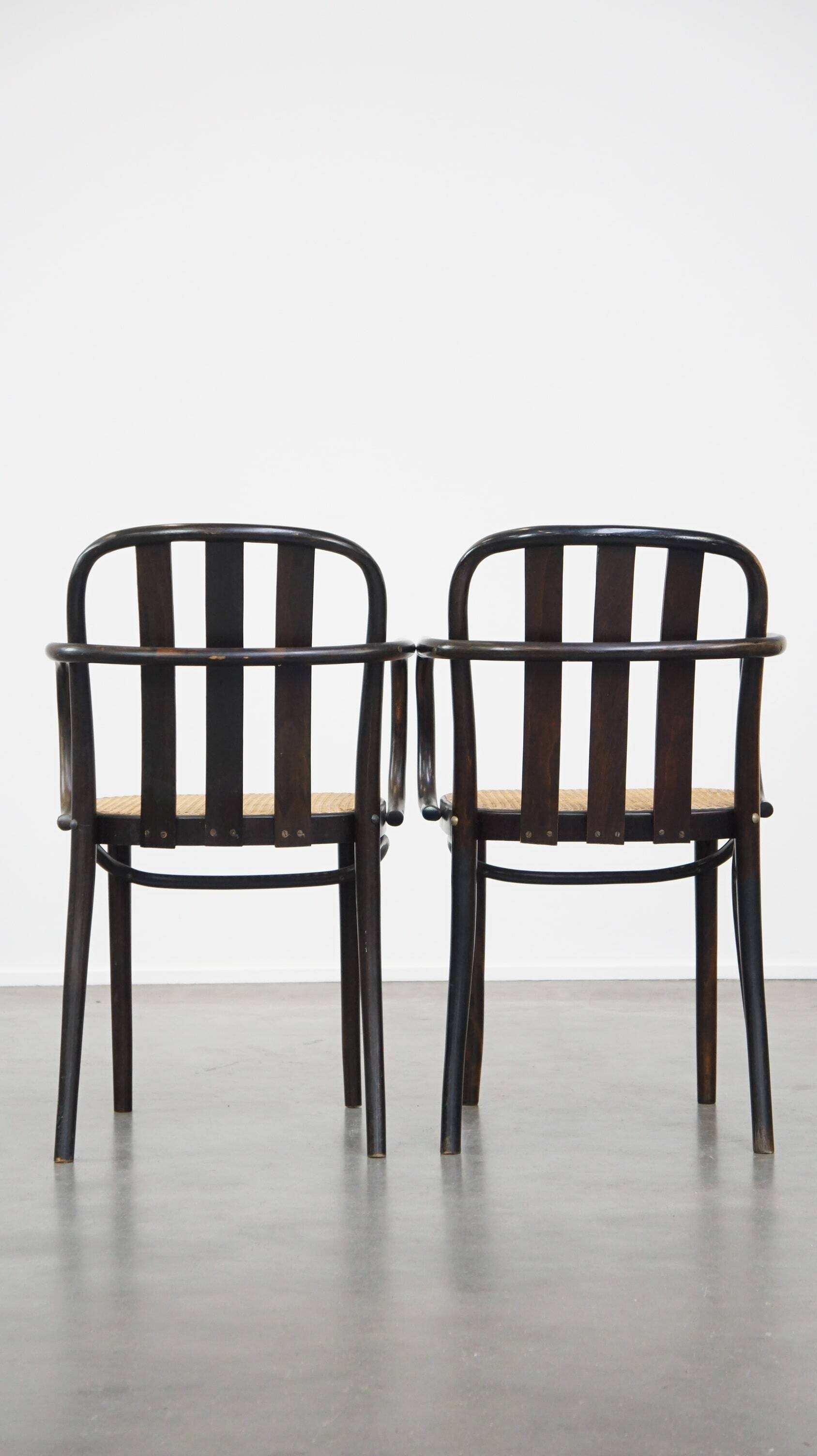 Set of 2 wooden dining chairs with woven seats
