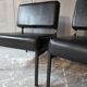 2 faux leather armchairs