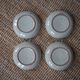 Set of 4 hollow plates in sandstone of the Marais