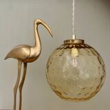 Vintage globe pendant light in amber glass