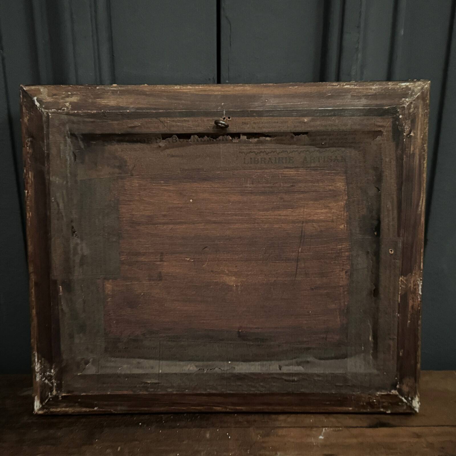 Oil on panel depicting a port from the early 20th century