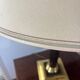 Empire style table lamp, gilded brass and black lacquered.