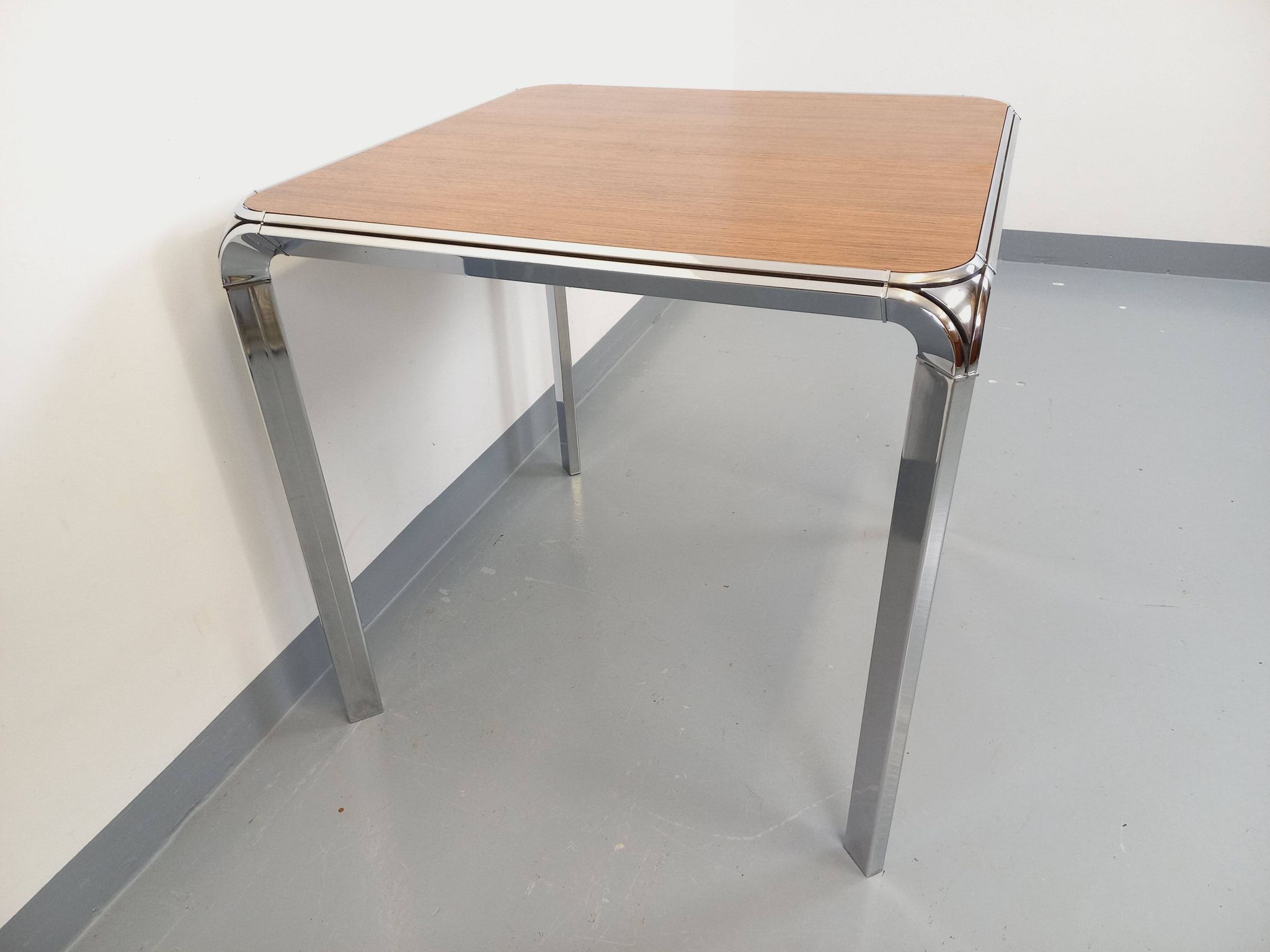 Pierre Paulin vintage square dining table in rosewood and metal