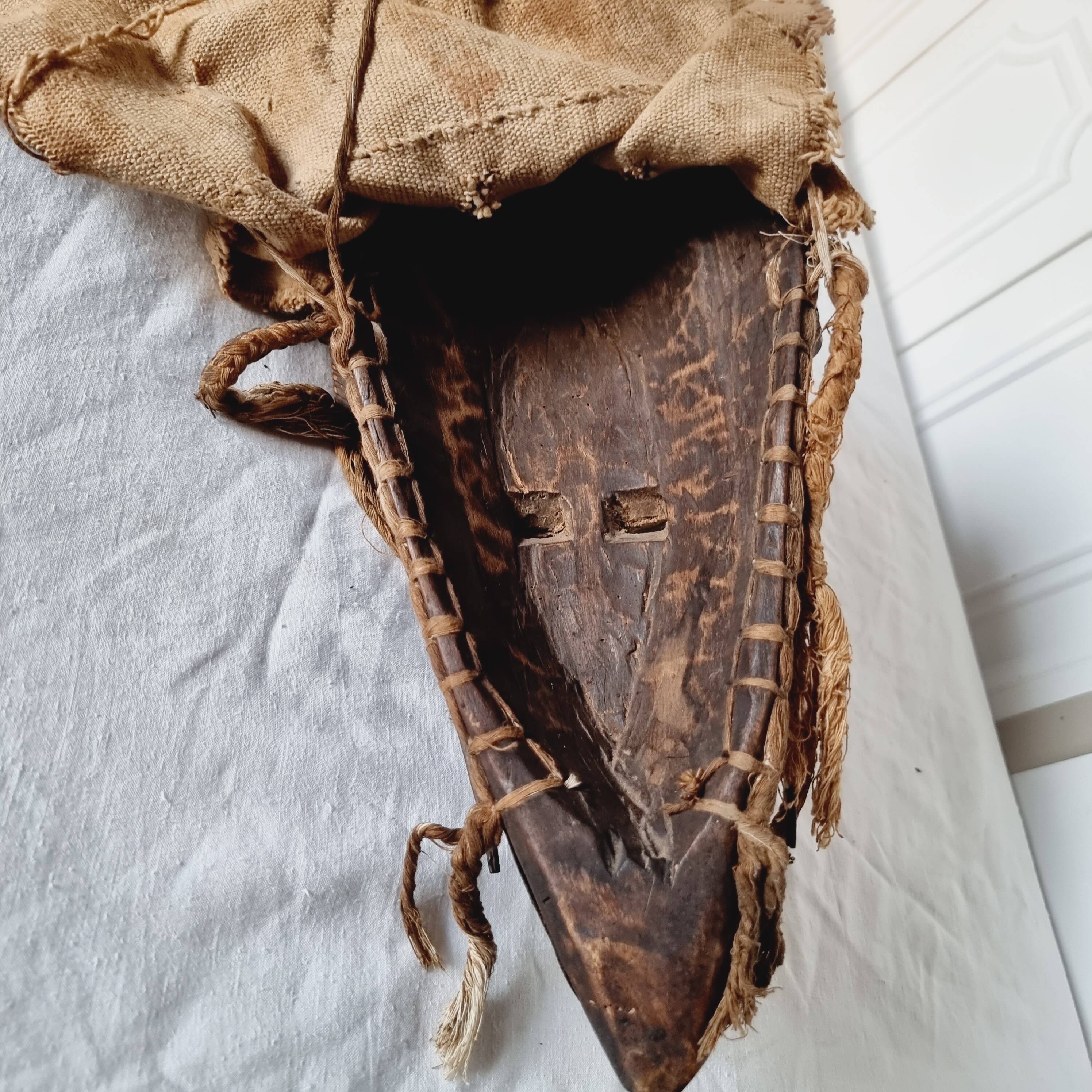 African mask from Mali from the N'Tomo tribe of Marka covered in chiseled brass