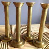 Series of 4 brass candlesticks