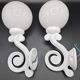 Pair of white enameled cast iron wall sconces, mid-20th century