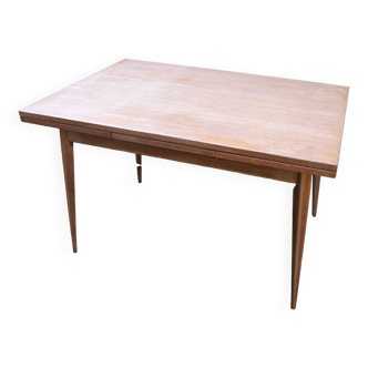 wooden dining table with compass legs and extensions