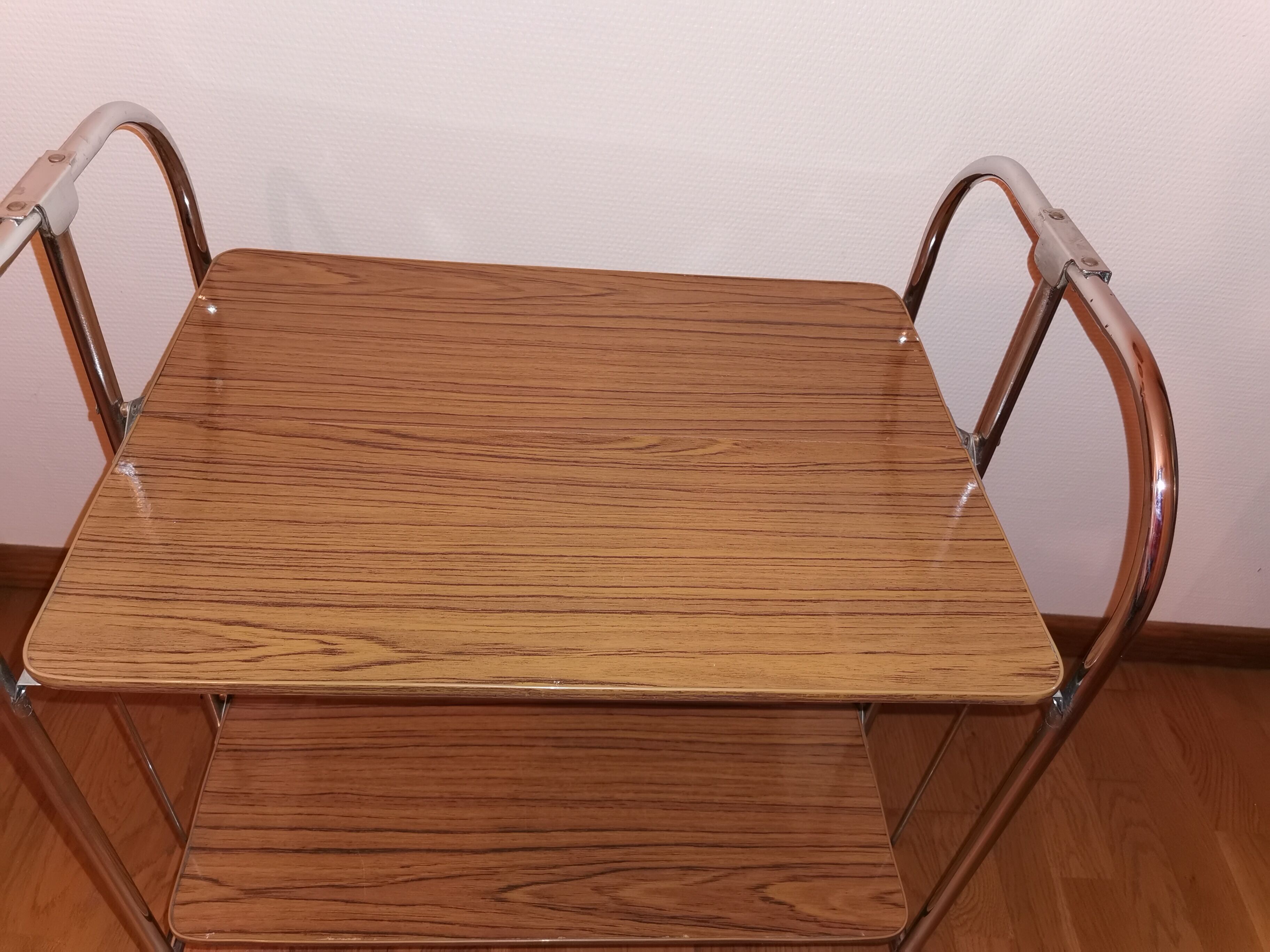 Vintage rolling and folding dessert trolley in chrome metal.
